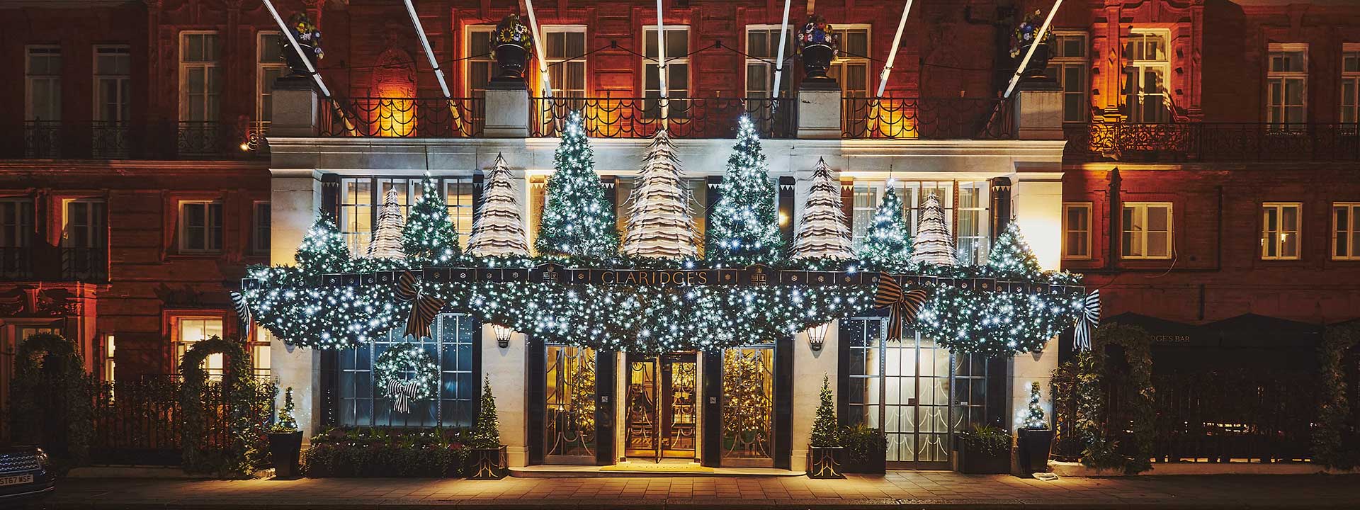 Claridge's Christmas facade with Christmas trees and stars