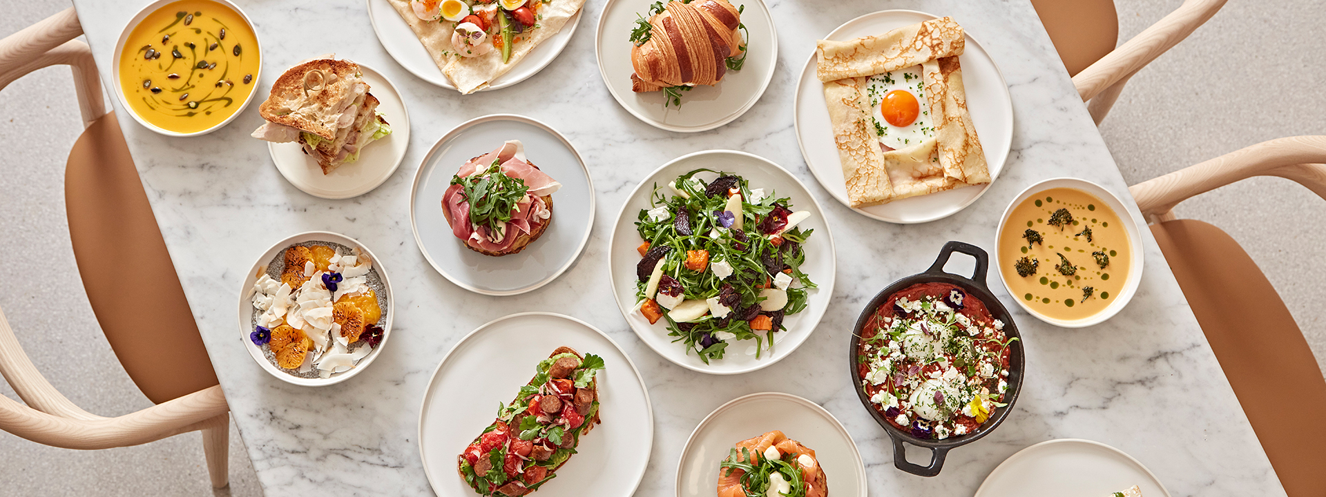 Colourful dishes on a table at Claridge's Artspace Café